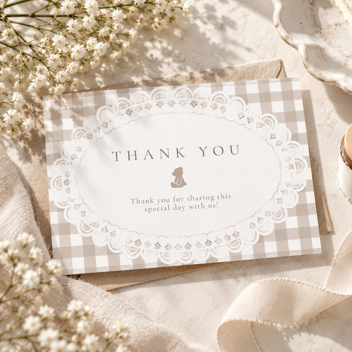 Free baby shower thank you card with a teddy bear, white lace doily and beige gingham