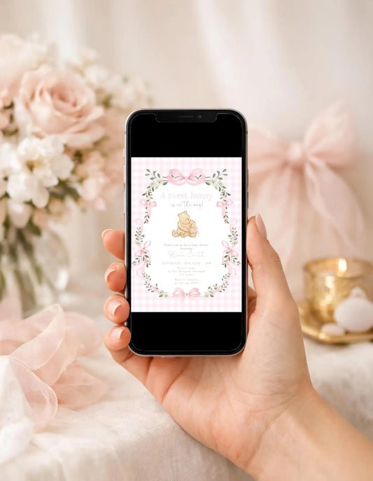 Editable details of pink winnie the pooh baby shower invitation with honey pot, gingham, daisies and bows