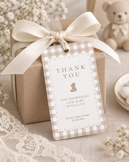 Teddy bear baby shower thank you favor tag on beige gingham tied to a gift box with a cream ribbon