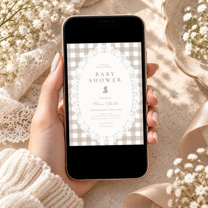 Teddy bear gingham baby shower invitation shown on a phone, ready to send by text